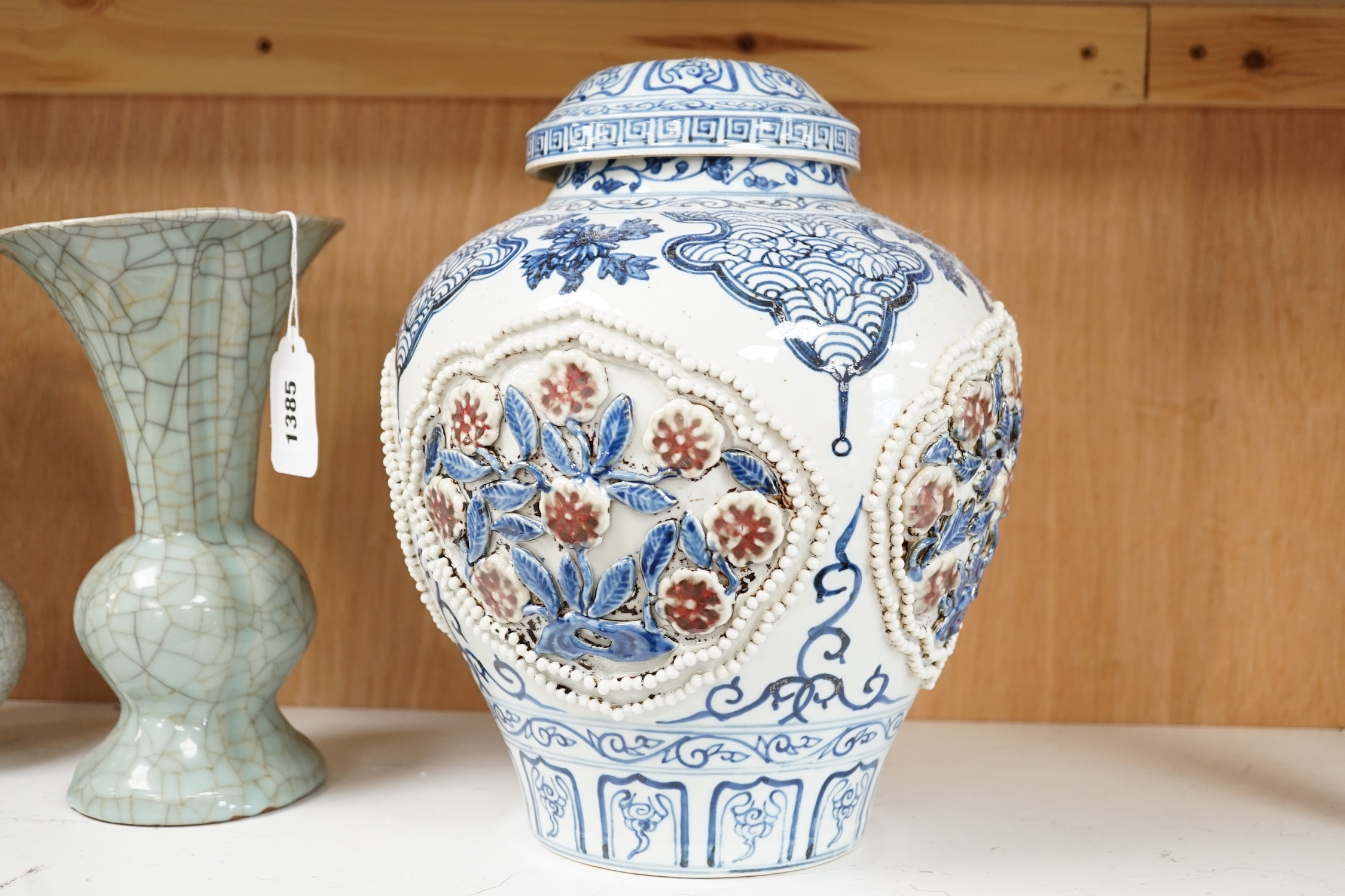 A Chinese underglaze blue and copper red lamp, two crackle glaze vases and a studio pottery bottle, largest 29cm high. Condition - fair